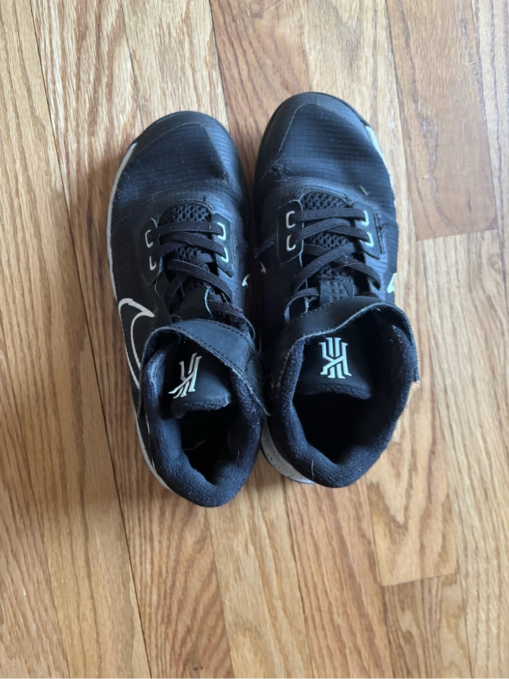Nike Black and White Kyrie Mid-Top Basketball Sneakers